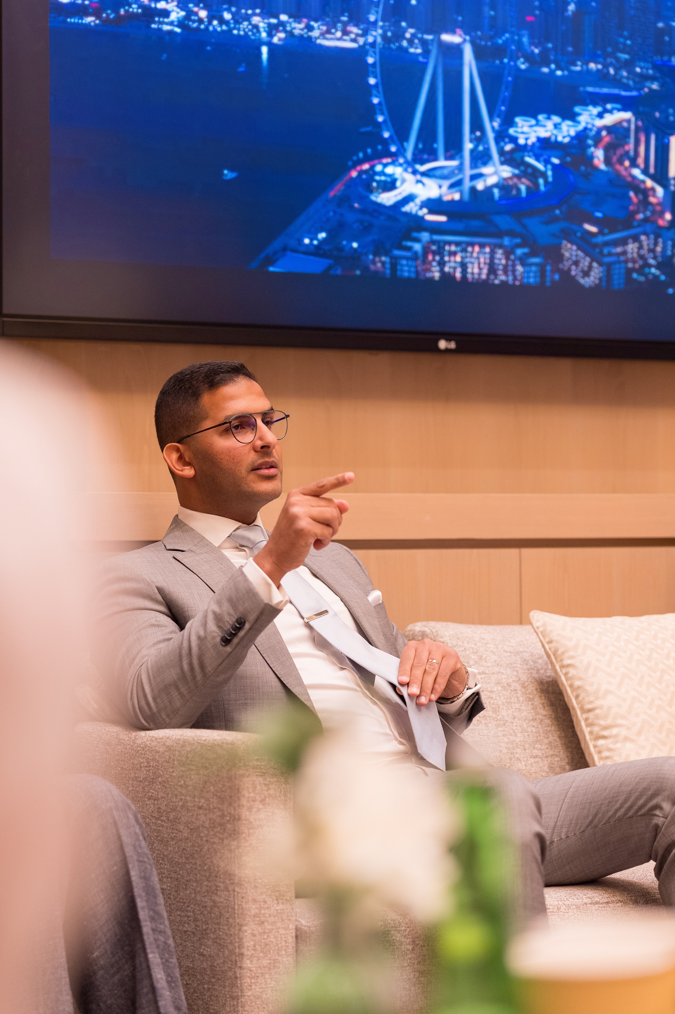Managing Partner of FB Legal Group speaking at a professional business event in Dubai.